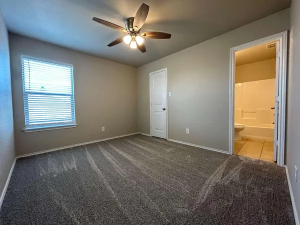 a view of a bedroom with a natural light
