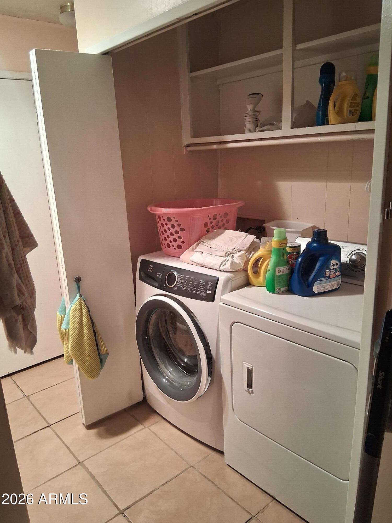 8600 East Broadway Road, Unit 58 Mesa, AZ 85208 - Photo 10 of 13 a utility room with dryer and washer