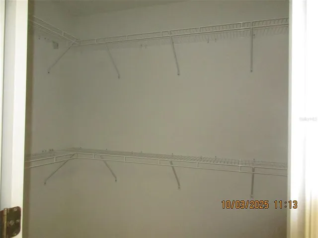 a view of a room with racks on the wall