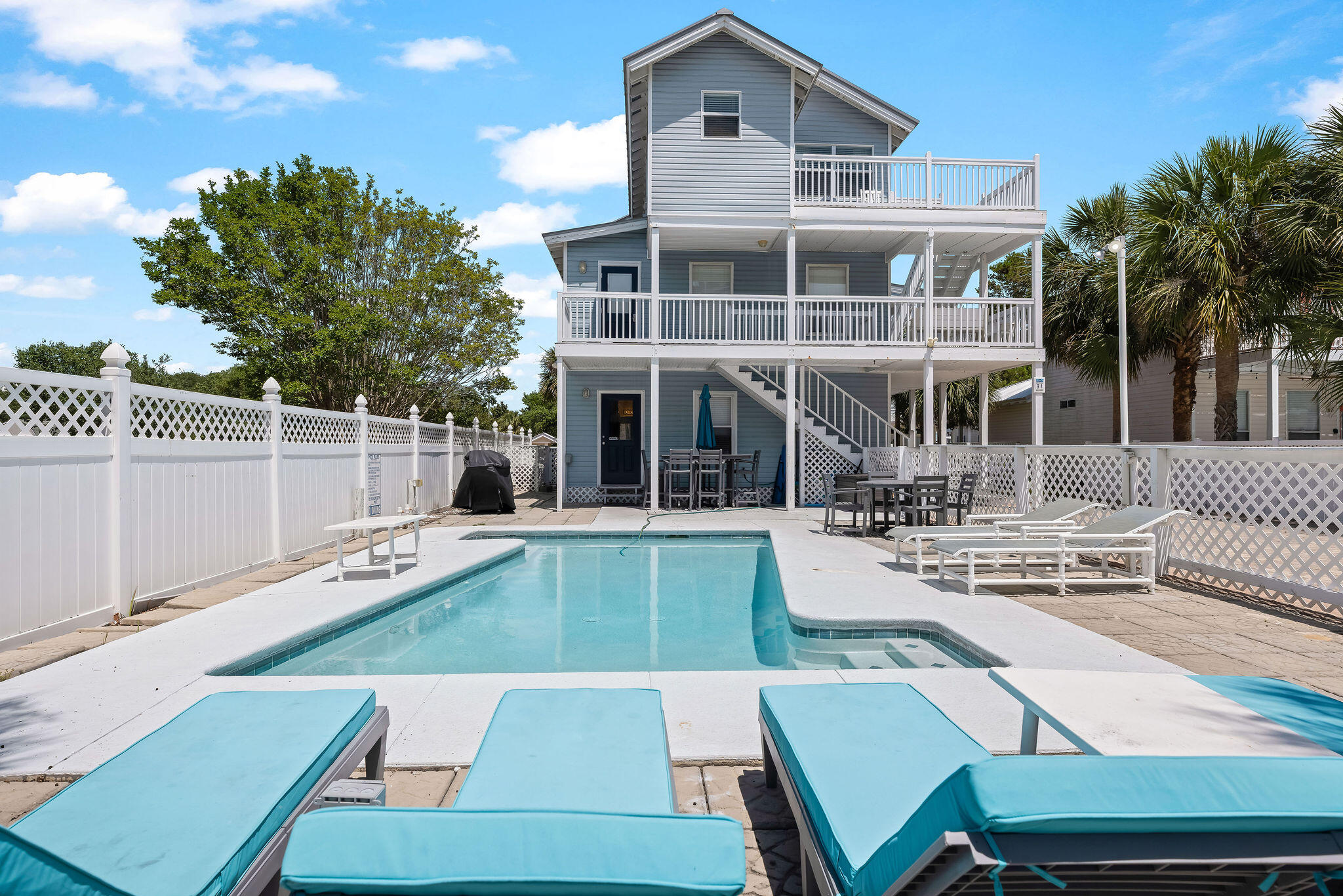 91 Matthew Boulevard Destin, FL 32541 - Photo 1 of 85 a view of a house with pool porch and sitting area