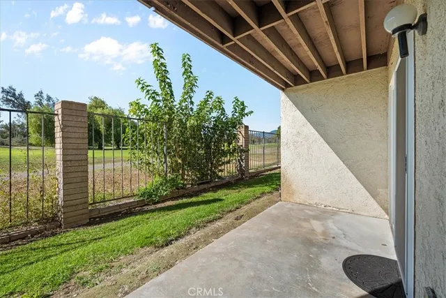 a view of backyard with green space