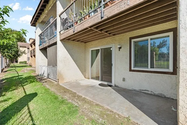 a view of backyard with a small cabin