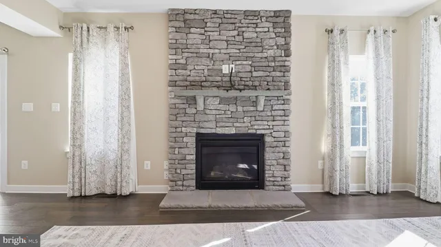 a living room with a fireplace