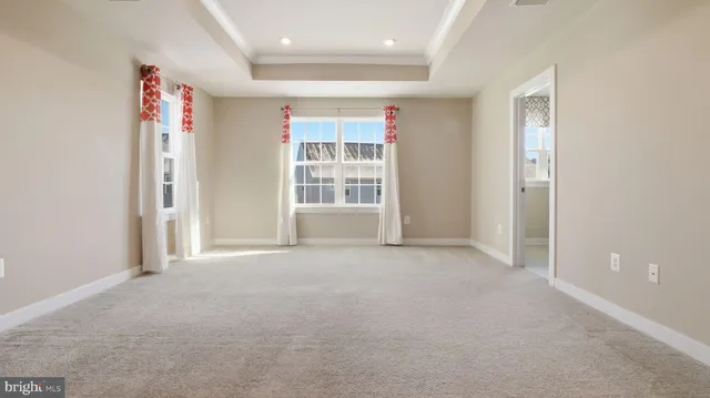 a bathroom with a granite countertop sink a mirror and a vanity