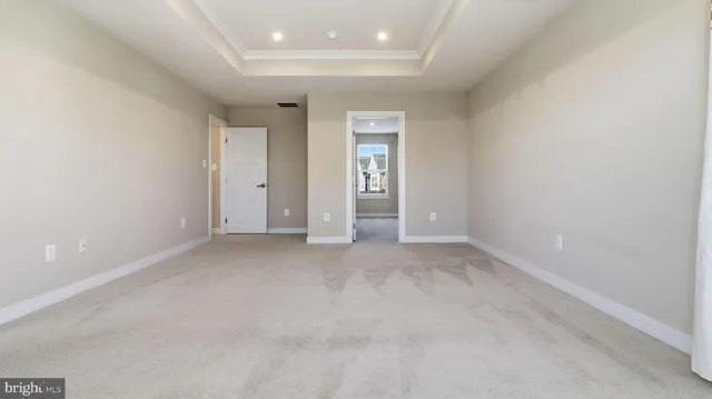 a bathroom with a shower and a sink