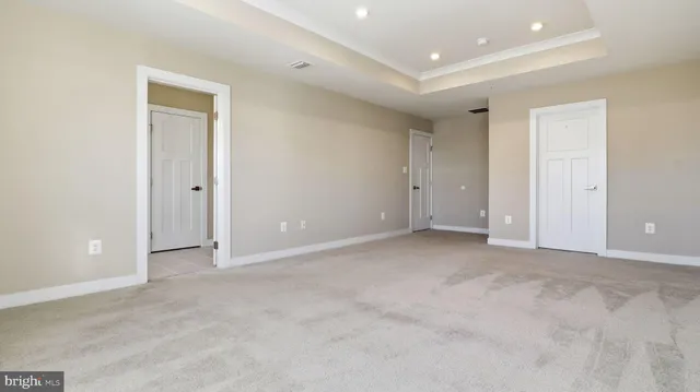 a bathroom with a granite countertop sink a shower and a mirror
