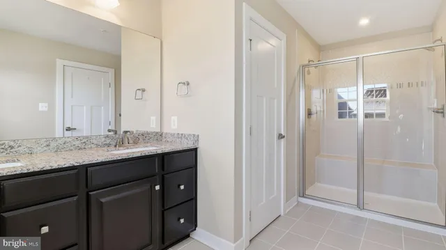 a view of hallway with window and entryway