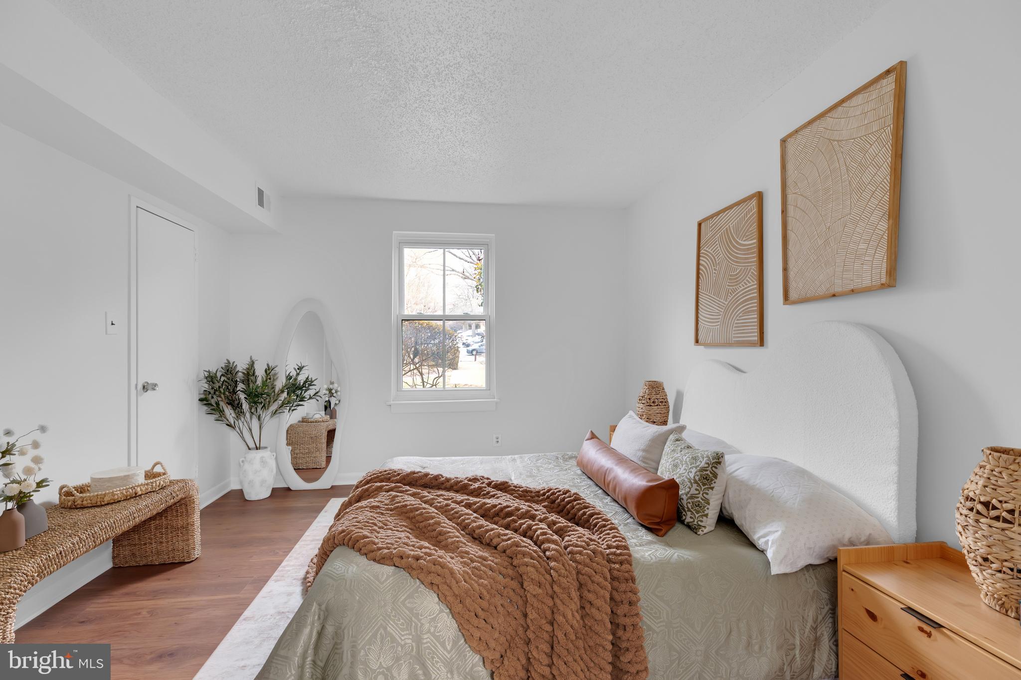 11637 Stoneview Square, Unit 2B Reston, VA 20191 - Photo 16 of 31 a bedroom with a bed and window