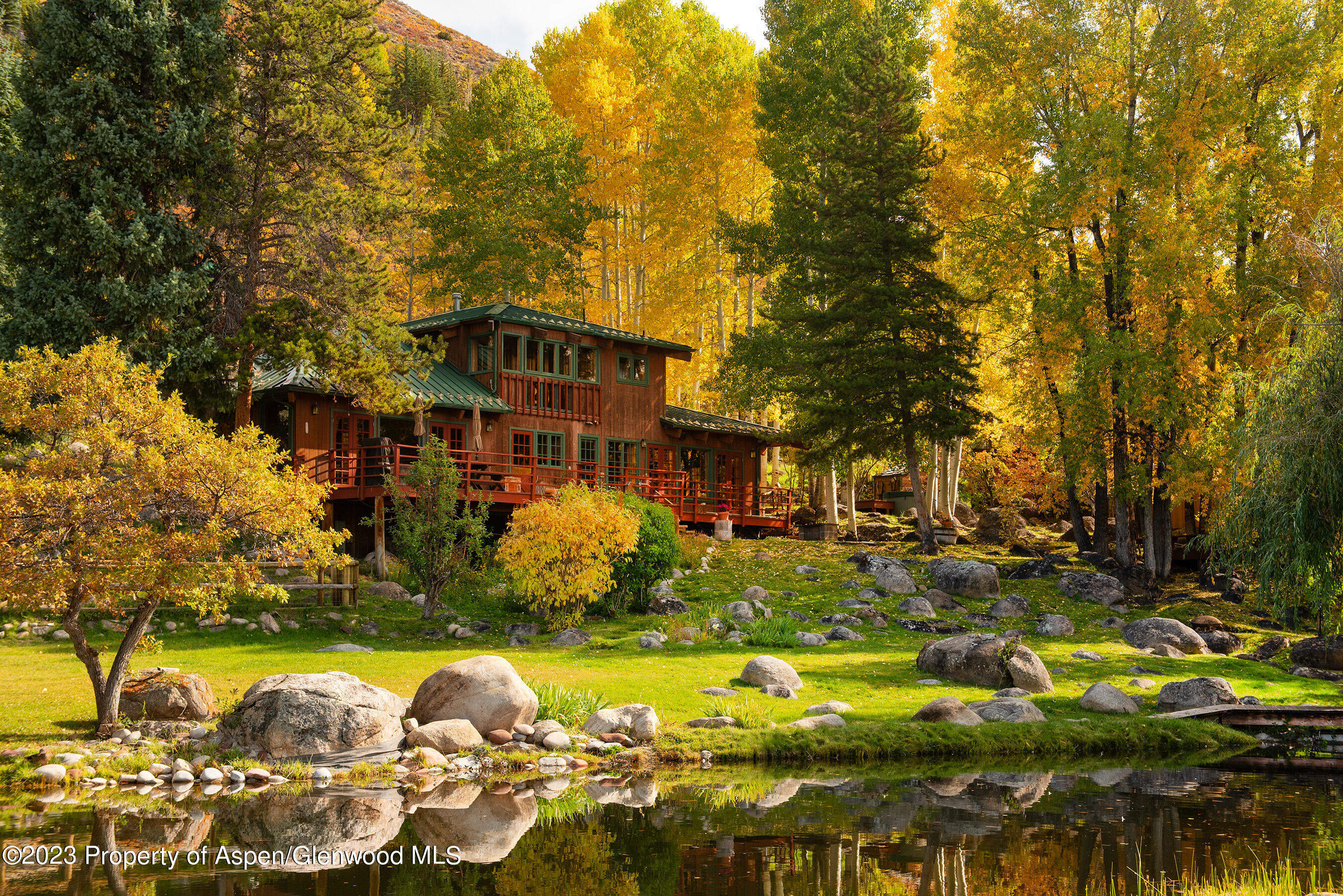a front view of a house with a ocean view