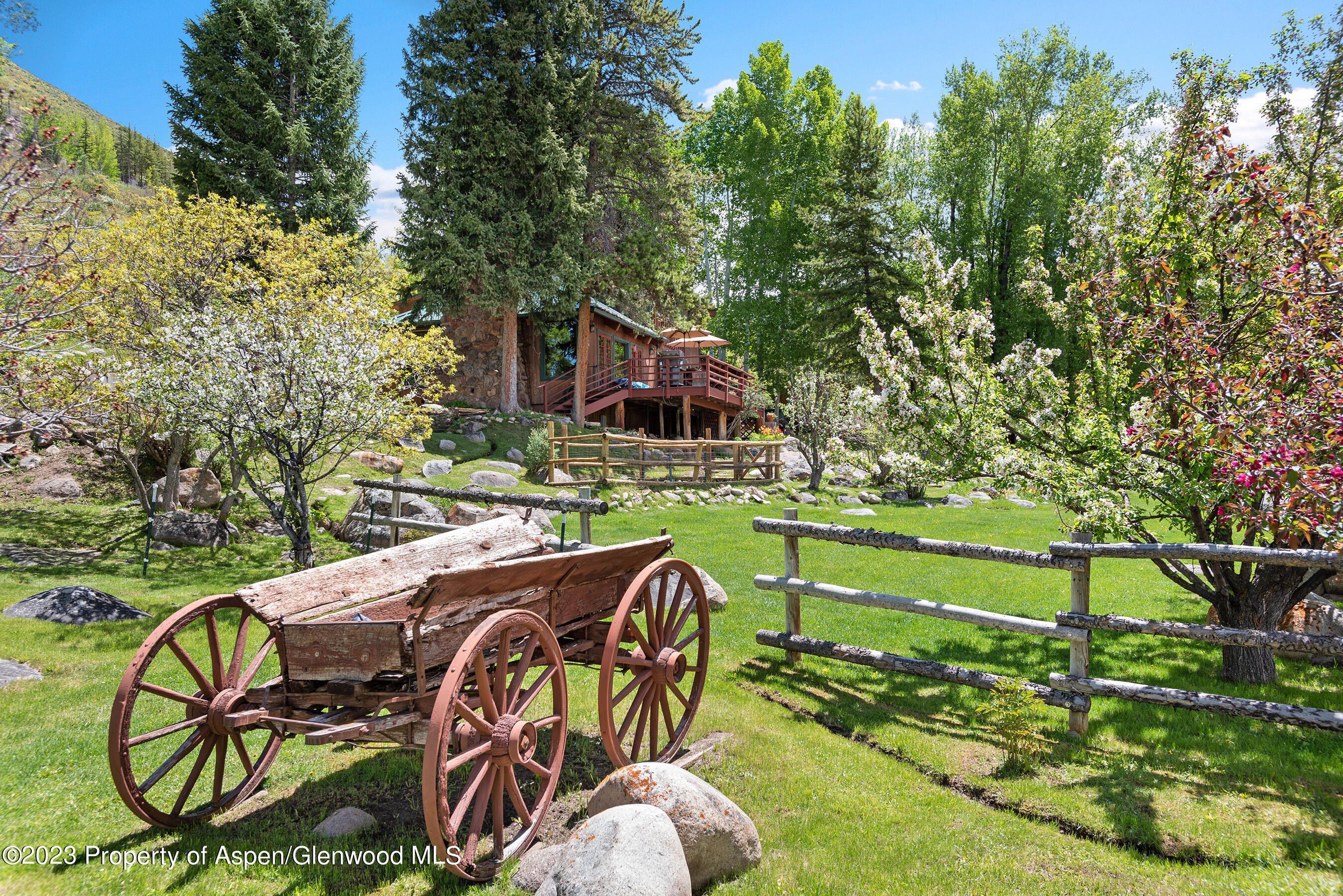 209 East Reds Road Aspen, CO 81612 - Photo 24 of 26 a view of backyard with swimming pool and outdoor seating