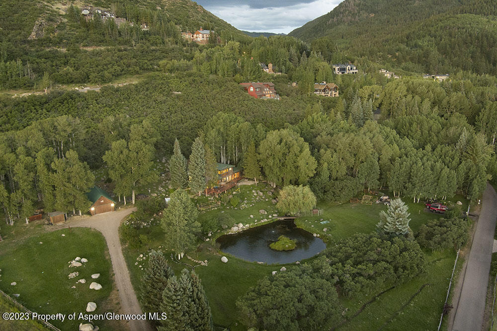 209 East Reds Road Aspen, CO 81612 - Photo 25 of 26 a view of residential houses with swimming pool