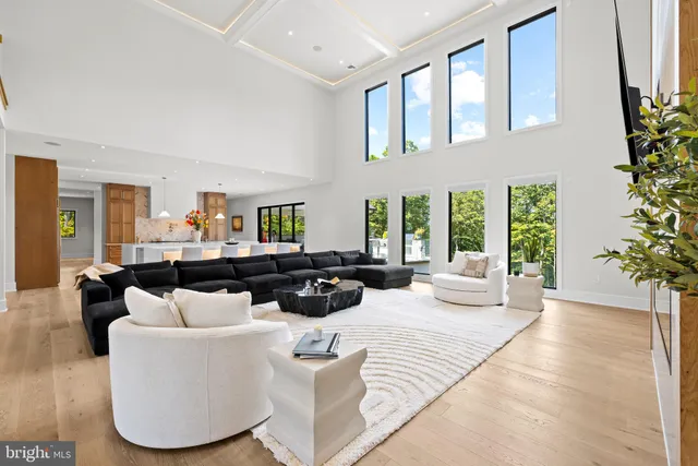 a kitchen with a table chairs and a refrigerator