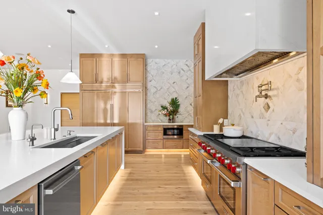 a view of a kitchen cabinets and wooden floor