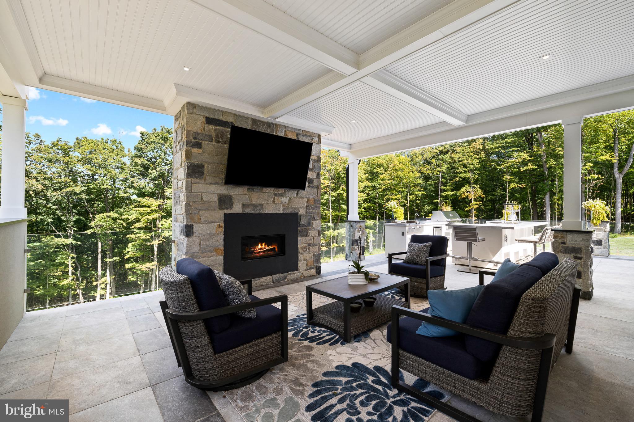 5895 Rodgers Road Pipersville, PA 18947 - Photo 19 of 37 Outdoor family room with fireplace and tv