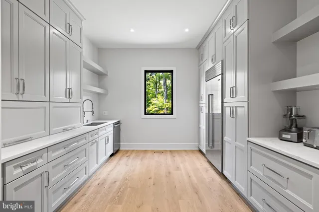 a spacious bedroom with a bed and a couch