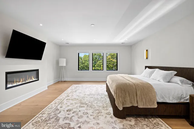 a building outdoor space with patio furniture and garden