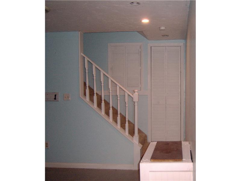 1131 O'Block Road Plum, PA 15239 - Photo 15 of 22 Den/Family/Great Room. Staircase to Lower Level