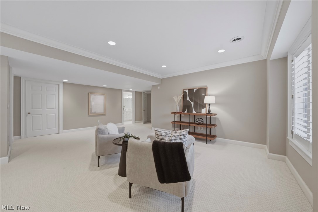 31900 Pinetree Road Pepper Pike, OH 44124 - Photo 35 of 43 The lower level bedroom incorporates a sitting area but the space could ideally accommodate a crib or another bed.