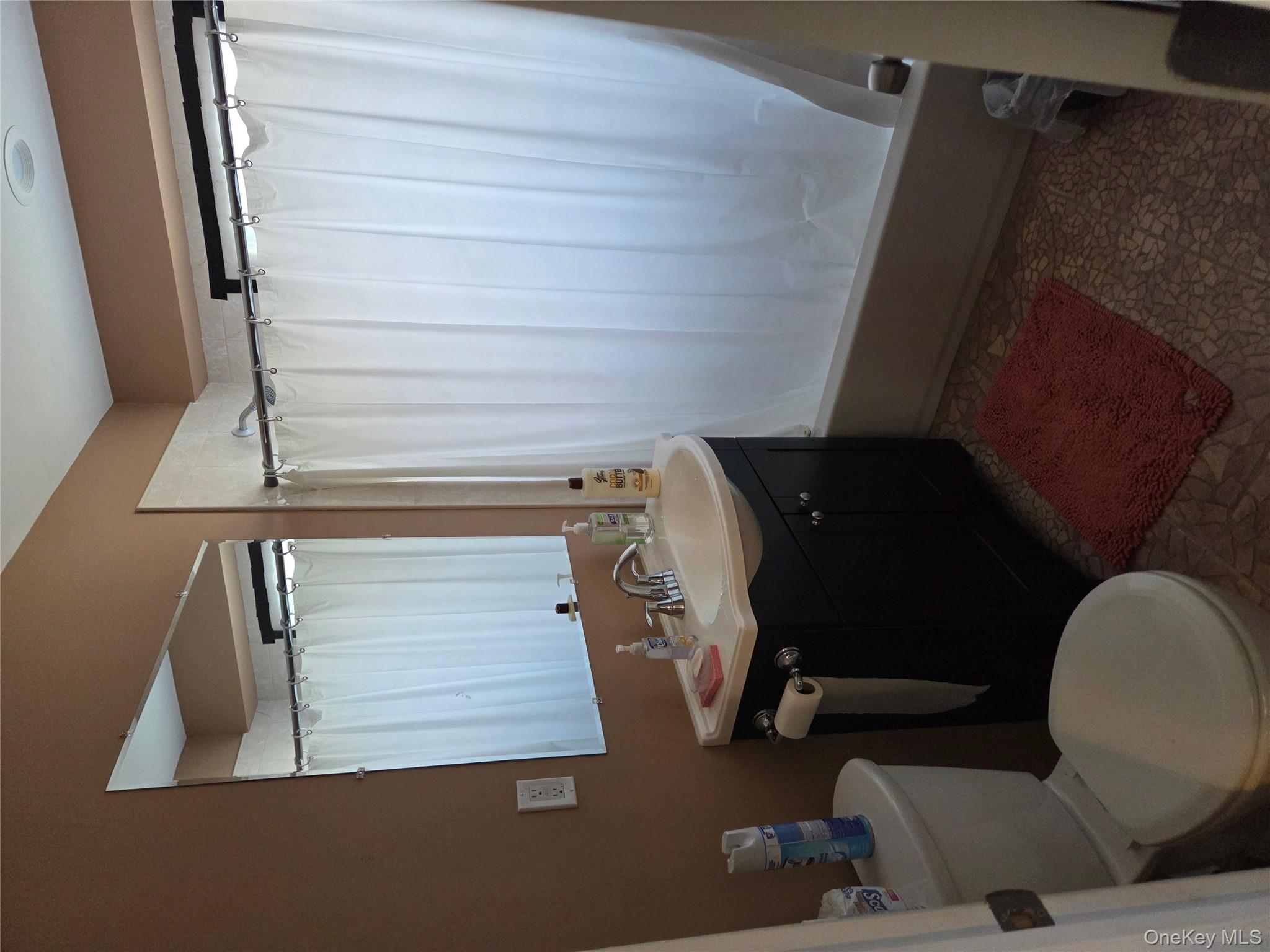 3095 Mullan Place Bronx, NY 10465 - Photo 9 of 12 Full bath with vanity and shower / bath combo