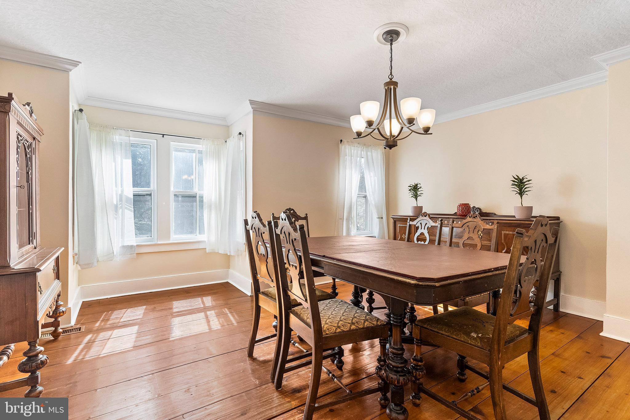 107 Millstone Road Millstone Township, NJ 08535 - Photo 14 of 28 Dining room with wide plank floors