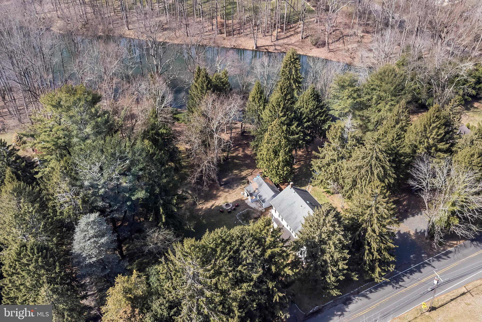 107 Millstone Road Millstone Township, NJ 08535 - Photo 22 of 28 Arial of property with home and lake