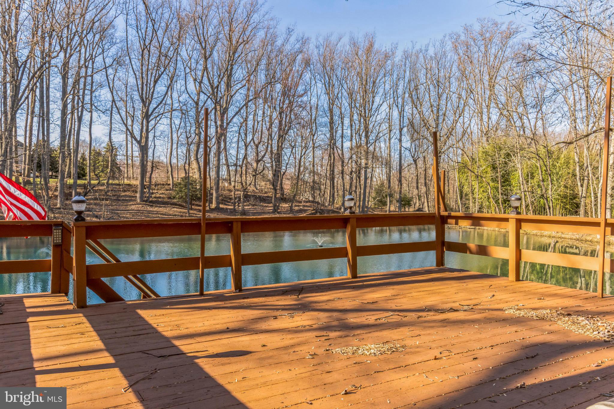 107 Millstone Road Millstone Township, NJ 08535 - Photo 24 of 28 Top deck on lake
