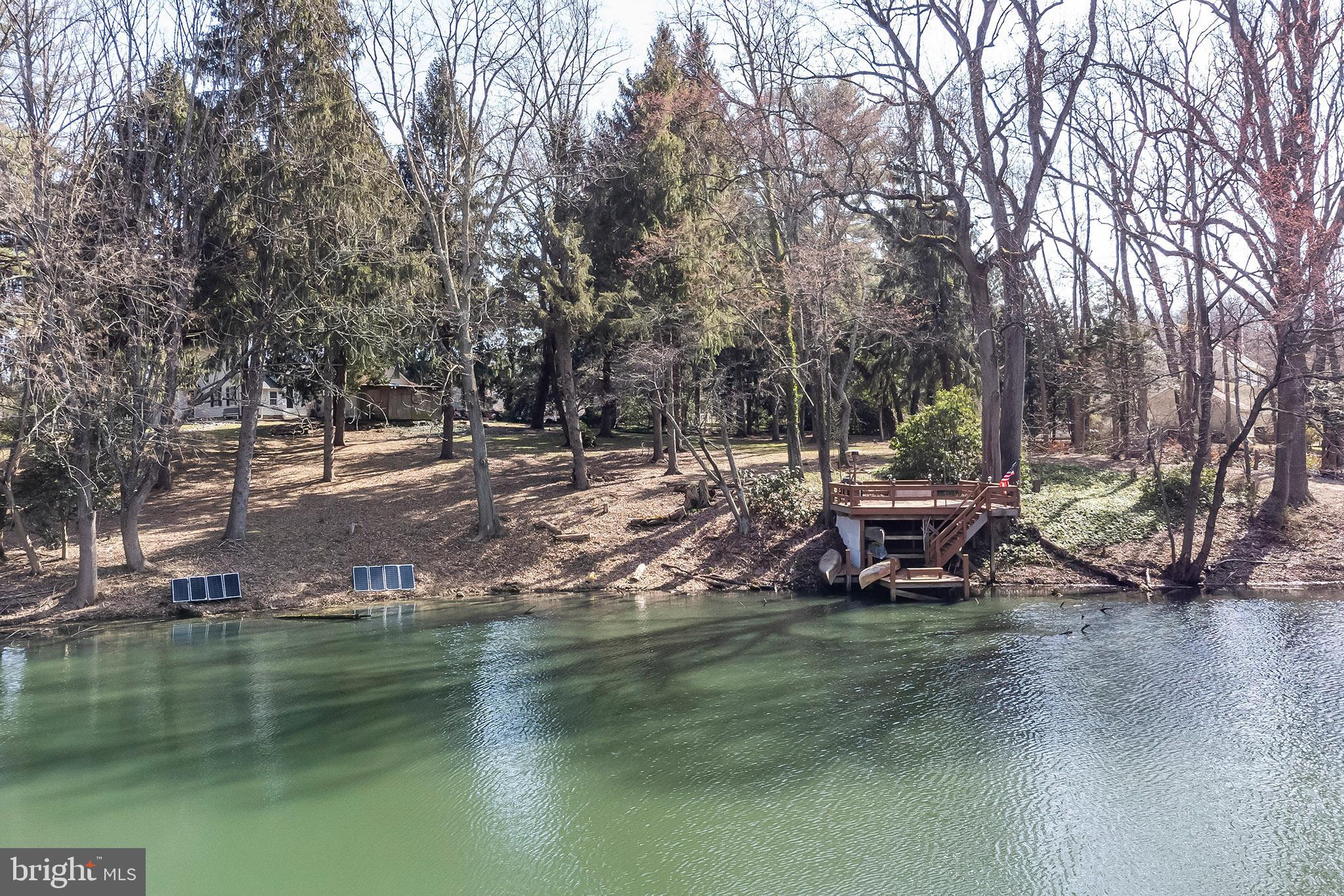 107 Millstone Road Millstone Township, NJ 08535 - Photo 6 of 28 Drone shot from lake
