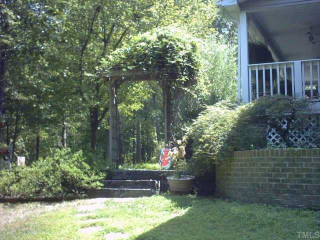 1287 Chub Lake Road Roxboro, NC 27574 - Photo 3 of 10 a view of backyard with green space