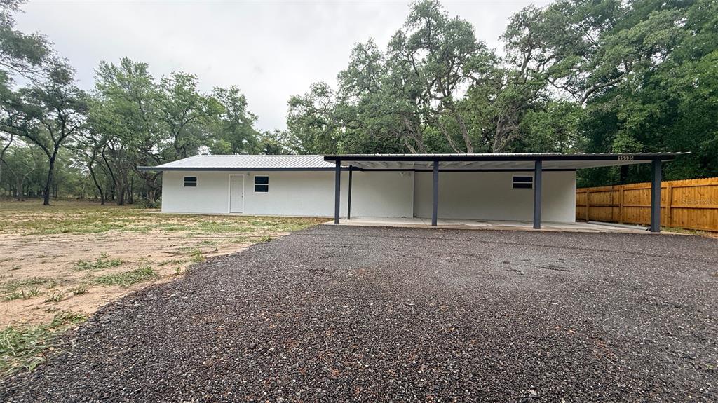 15535 Little Ranch Road Spring Hill, FL 34610 - Photo 1 of 46 a view of backyard with green space