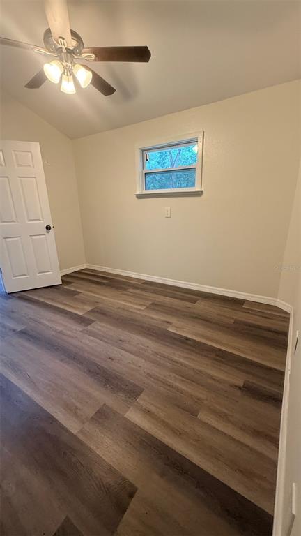 15535 Little Ranch Road Spring Hill, FL 34610 - Photo 14 of 46 a view of empty room with wooden floor
