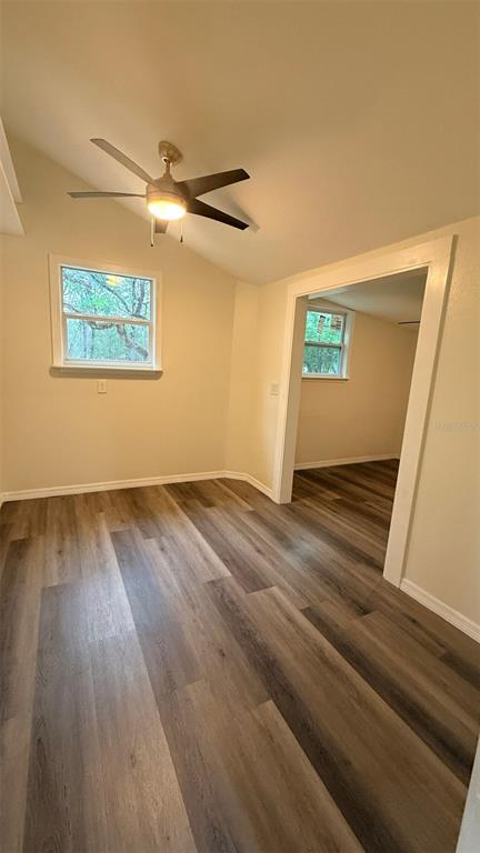 15535 Little Ranch Road Spring Hill, FL 34610 - Photo 17 of 46 a view of empty room with wooden floor