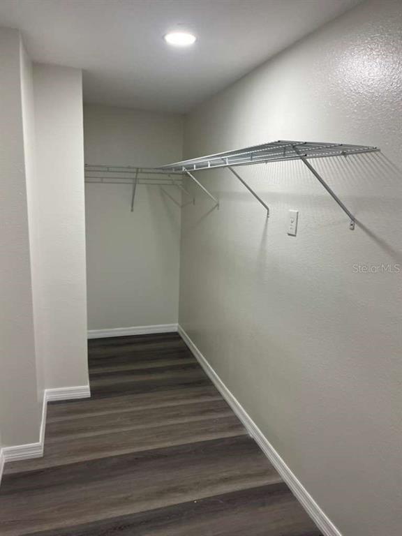 15535 Little Ranch Road Spring Hill, FL 34610 - Photo 18 of 46 a view of an empty walk in closet