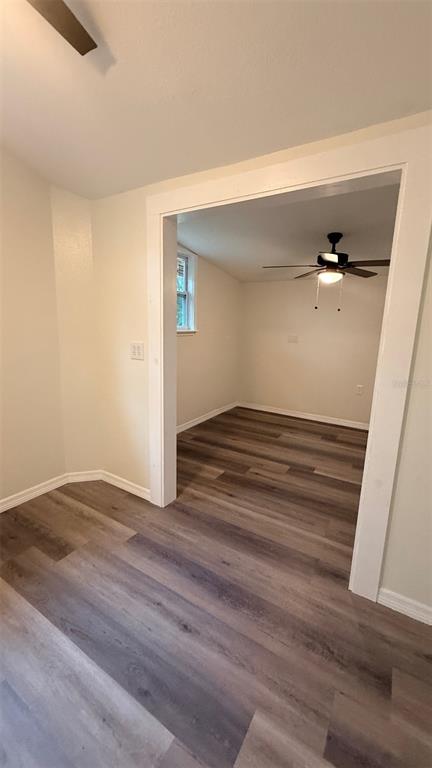 15535 Little Ranch Road Spring Hill, FL 34610 - Photo 23 of 46 a view of room with wooden floor
