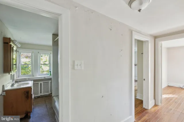 a view of livingroom with hardwood floor and a window