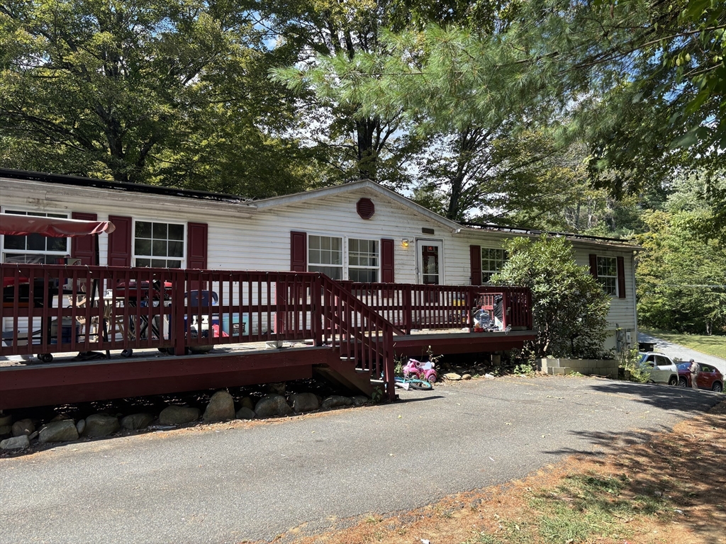 a front view of a house with garage