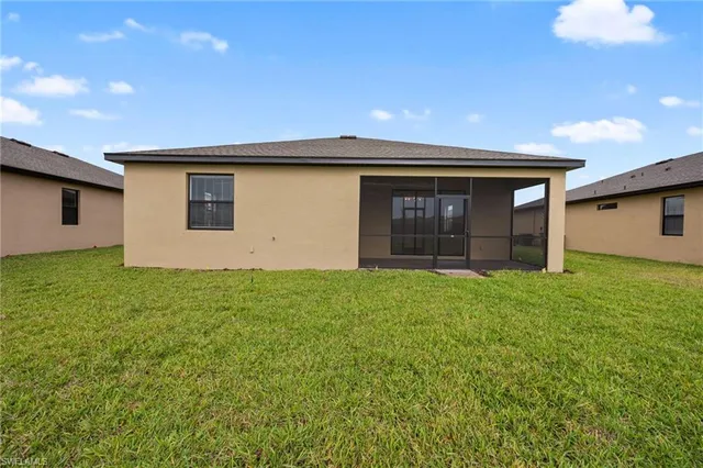 a front view of house with yard