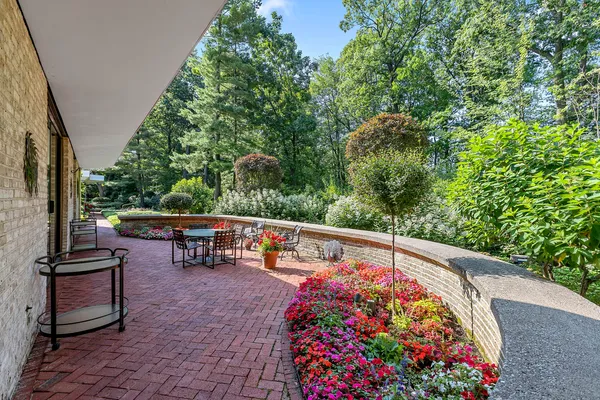a view of outdoor sitting area with furniture