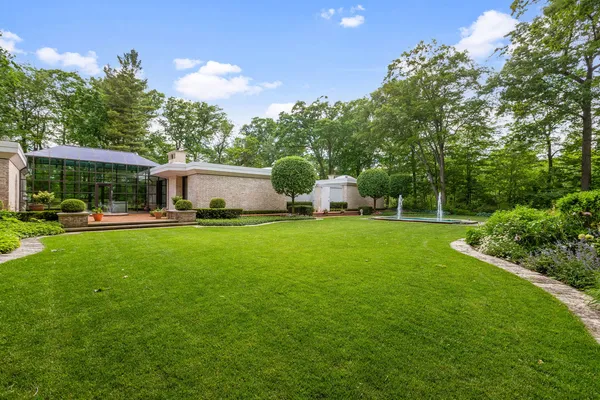 a view of a house with a big yard