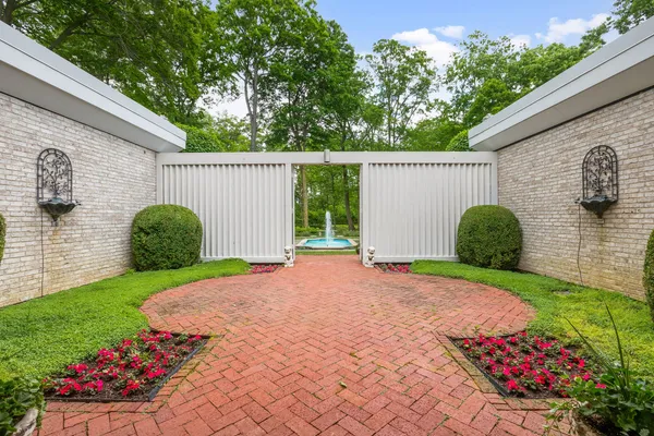 a view of a backyard with a garden