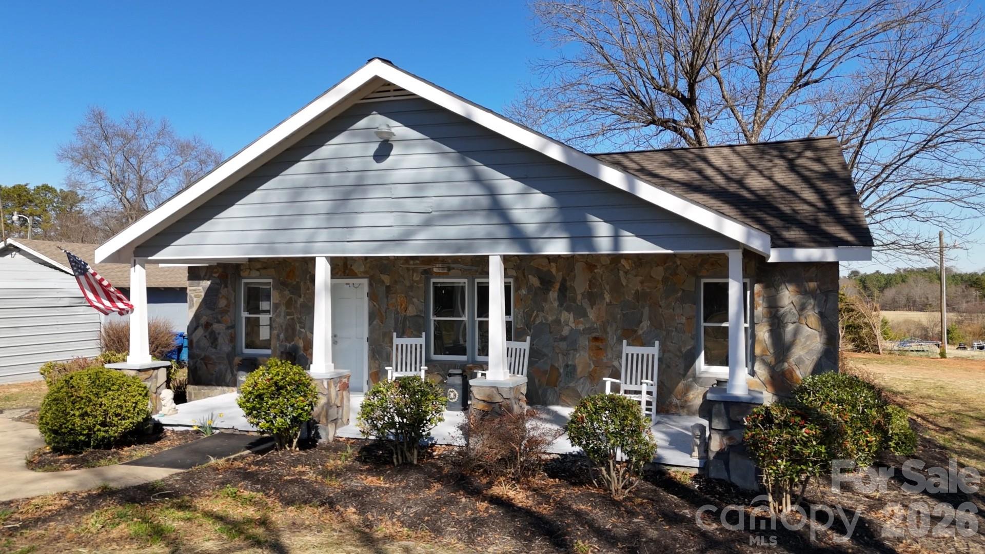 1943 Big Island Road Rutherfordton, NC 28139 - Photo 11 of 35 a front view of a house with garden