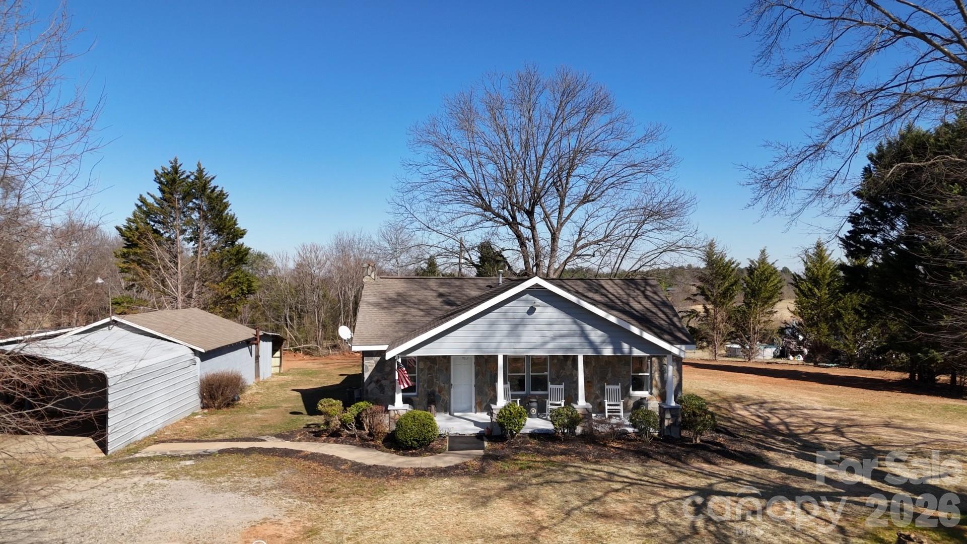 1943 Big Island Road Rutherfordton, NC 28139 - Photo 12 of 35 a front view of a house with garden