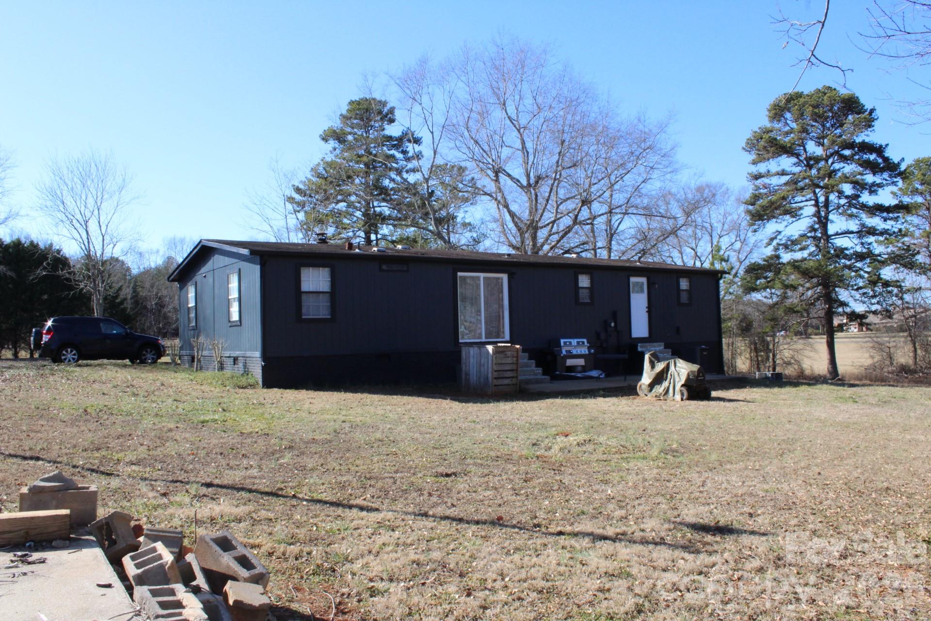 1943 Big Island Road Rutherfordton, NC 28139 - Photo 2 of 35 a house view with a outdoor space