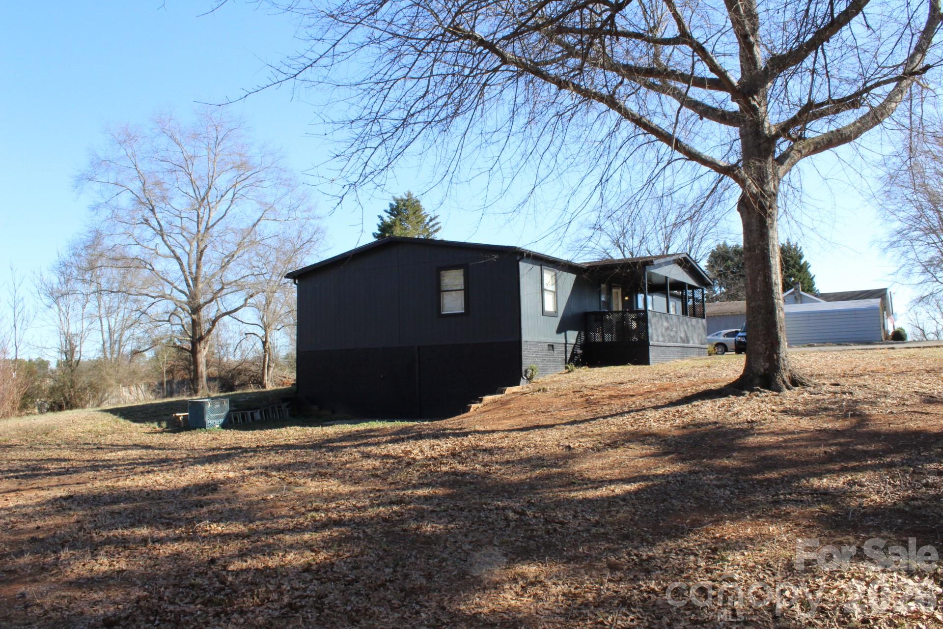 1943 Big Island Road Rutherfordton, NC 28139 - Photo 3 of 35 a front view of a house with a yard