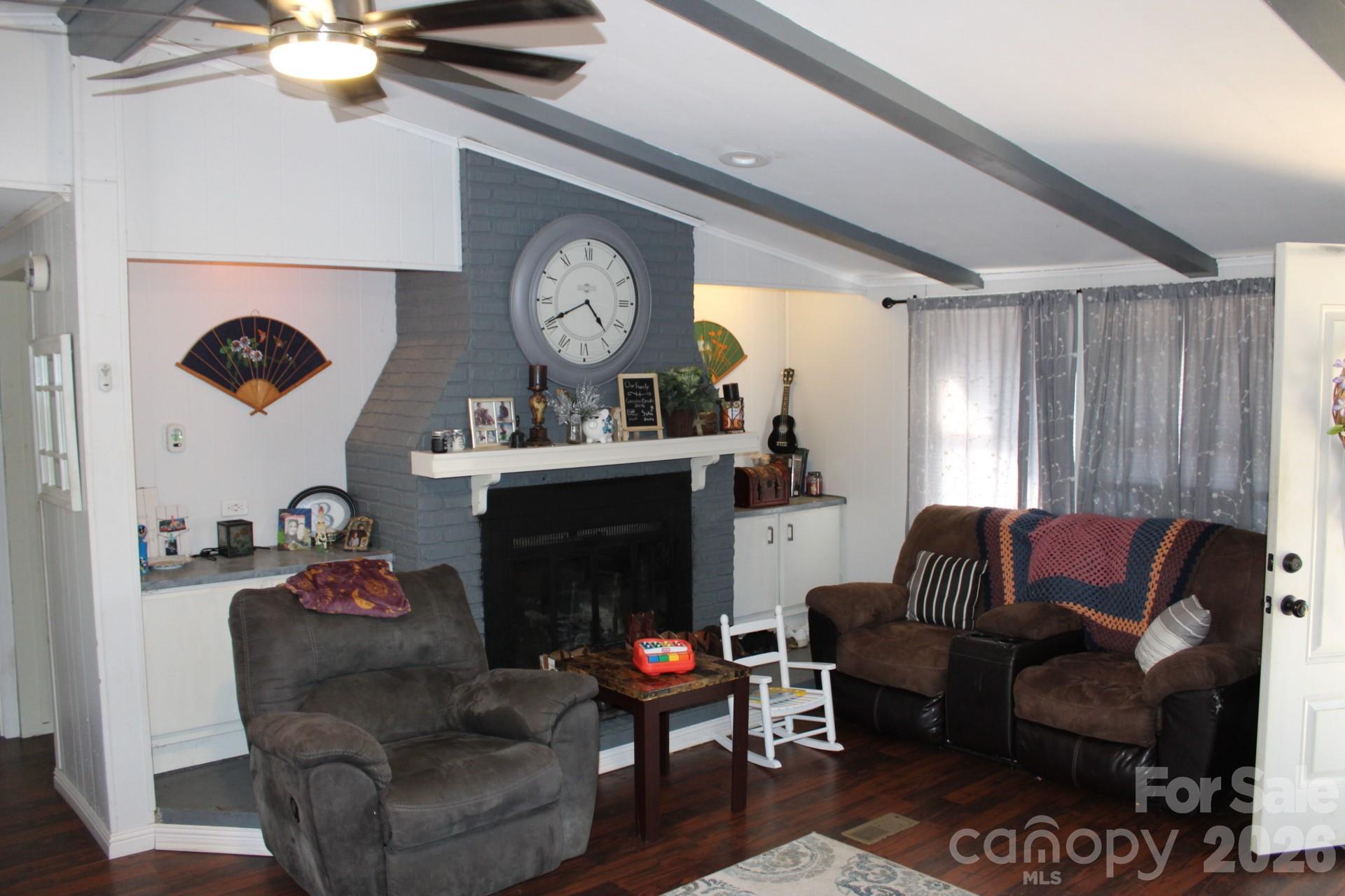 1943 Big Island Road Rutherfordton, NC 28139 - Photo 31 of 35 a living room with furniture and a fireplace