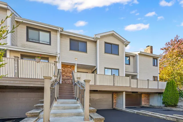 a house view with a garden space