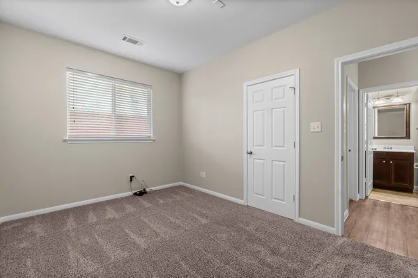 a view of a room with a sink and a window