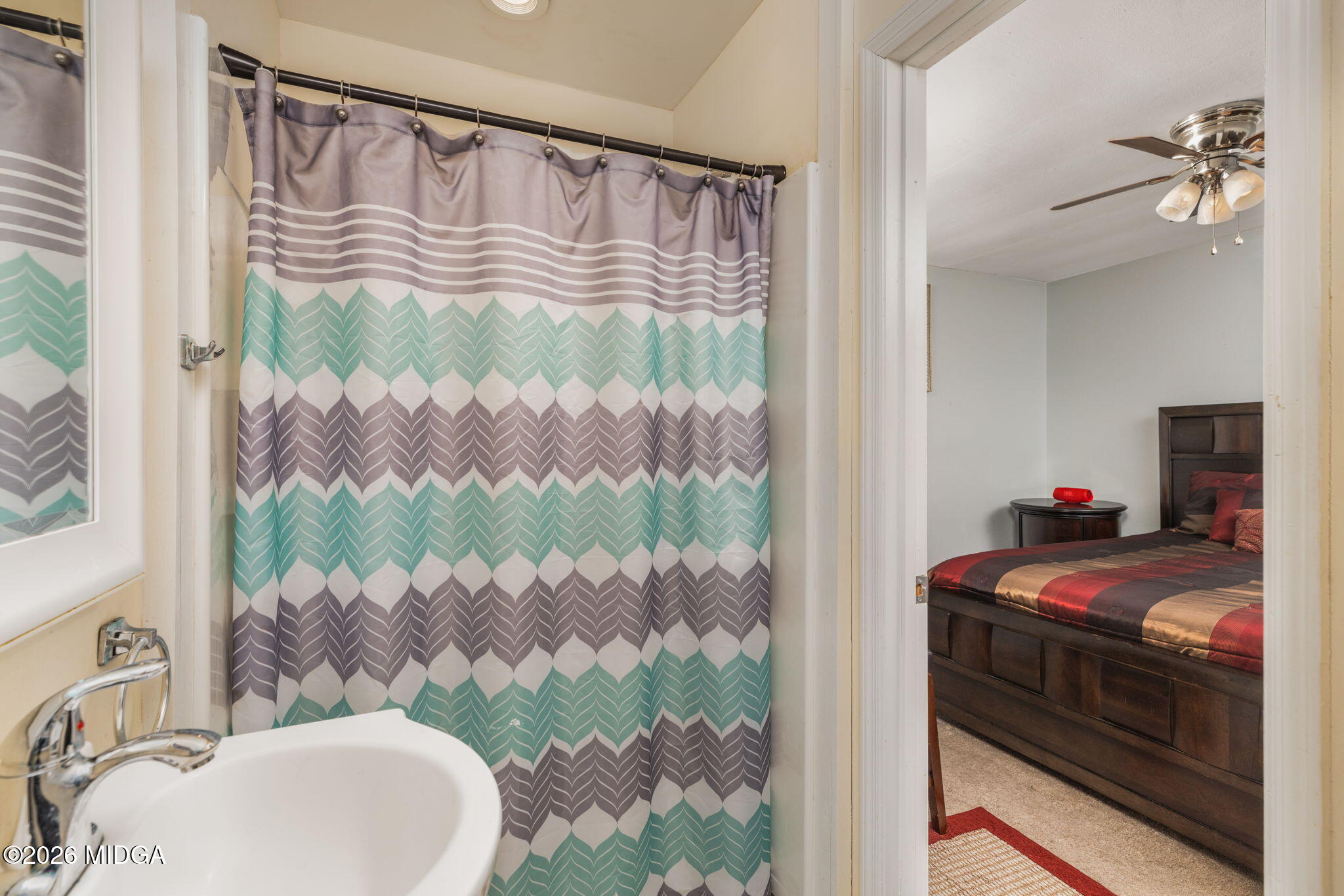 1422 Forest Hill Road Macon, GA 31210 - Photo 21 of 28 a bathroom with a sink mirror and vanity