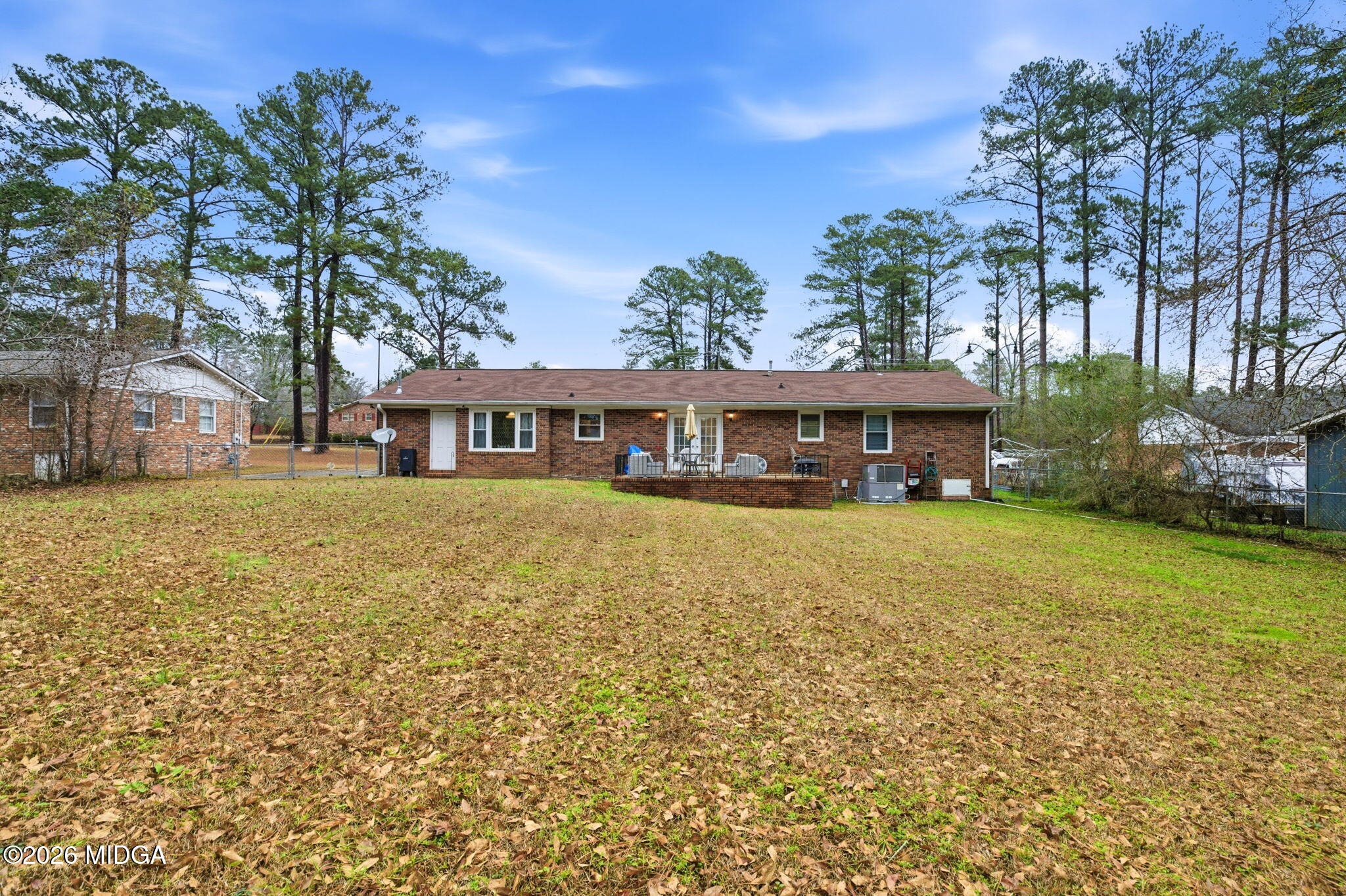 1422 Forest Hill Road Macon, GA 31210 - Photo 26 of 28 a front view of a house with a yard
