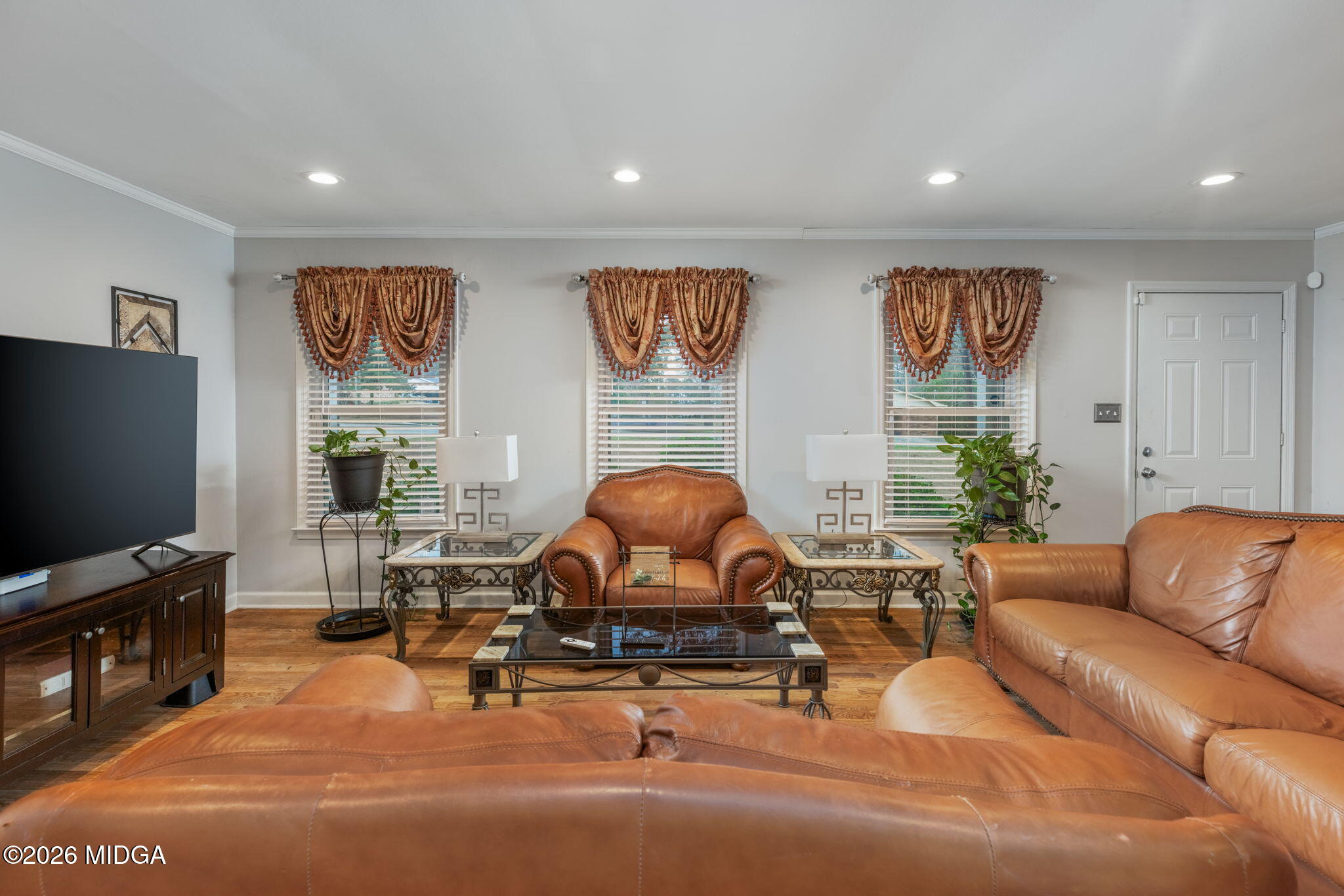 1422 Forest Hill Road Macon, GA 31210 - Photo 7 of 28 a living room with furniture and a flat screen tv