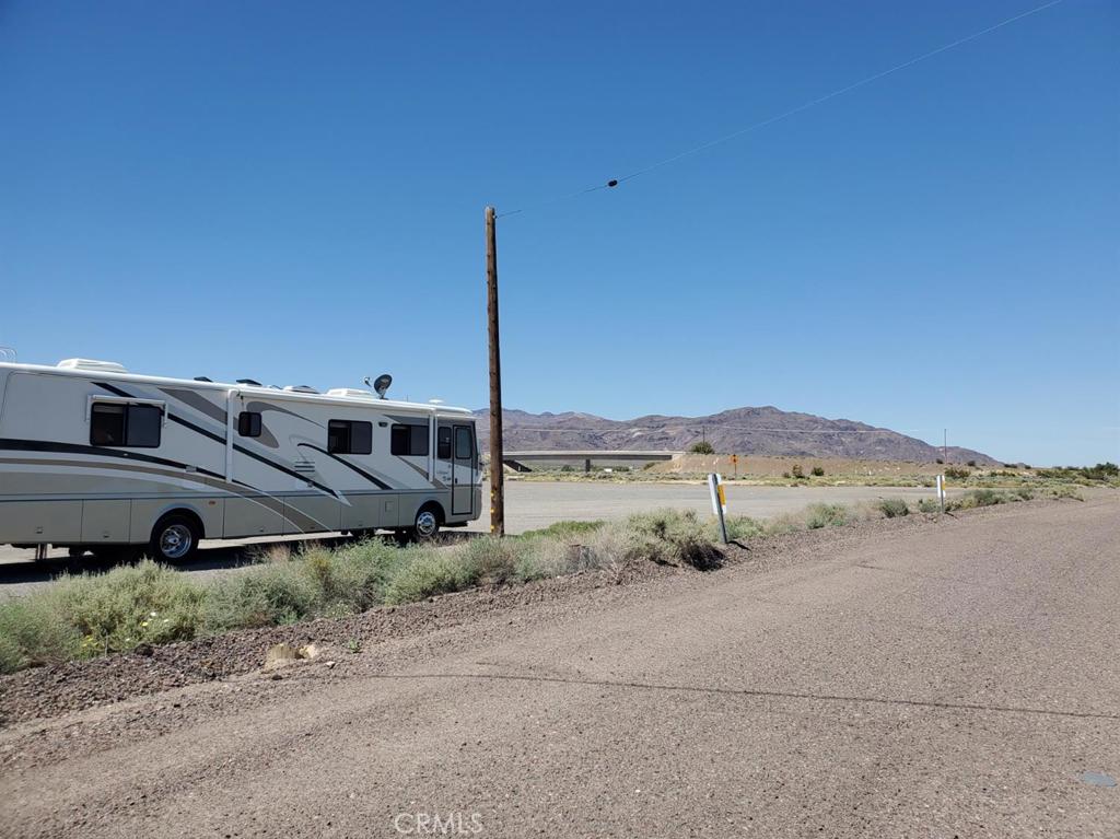 0 Autumn Leaf Road Newberry Springs, CA 92365 - Photo 6 of 10 a front view of a house with a yard